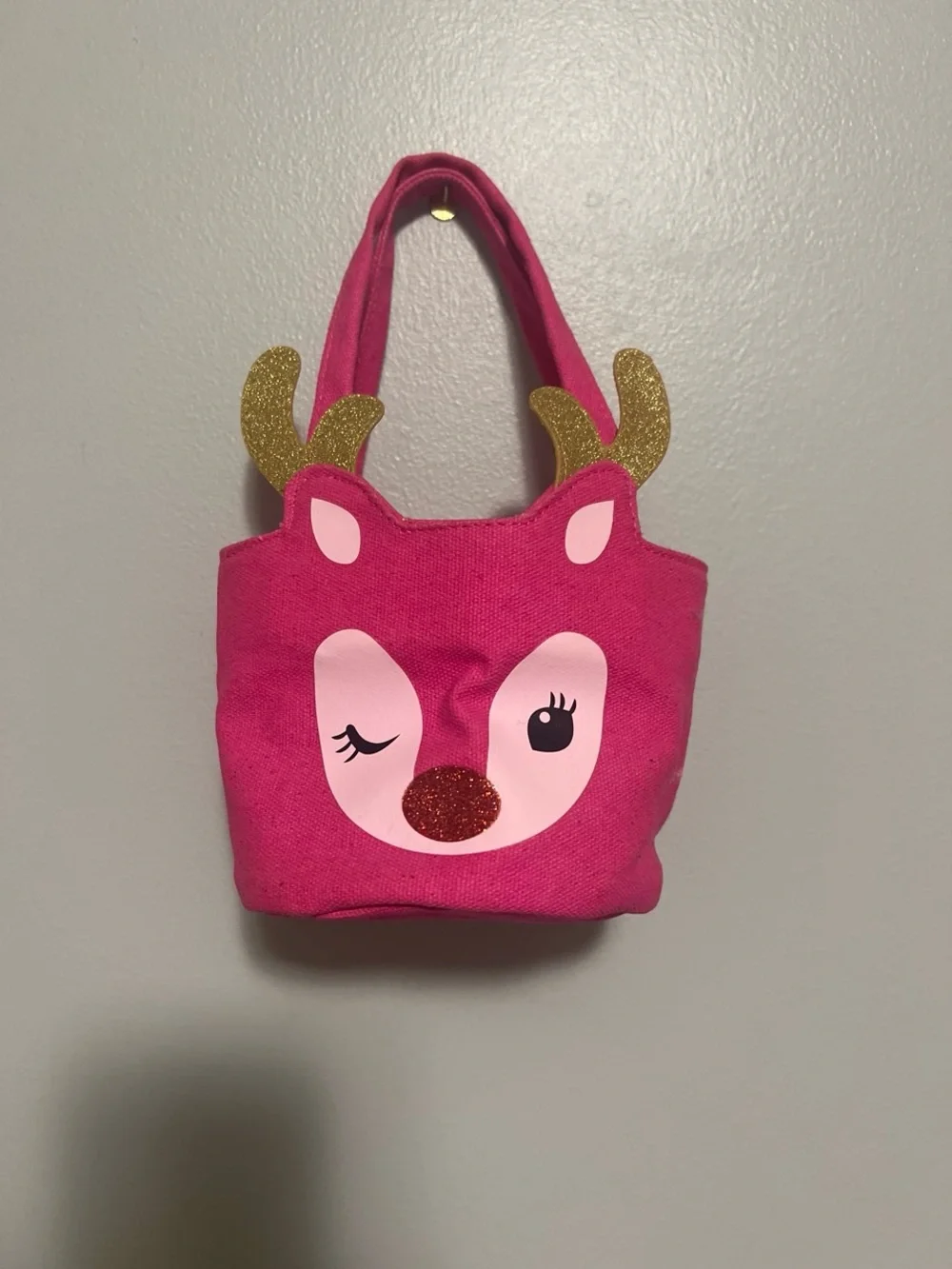 Pink reindeer gift bag